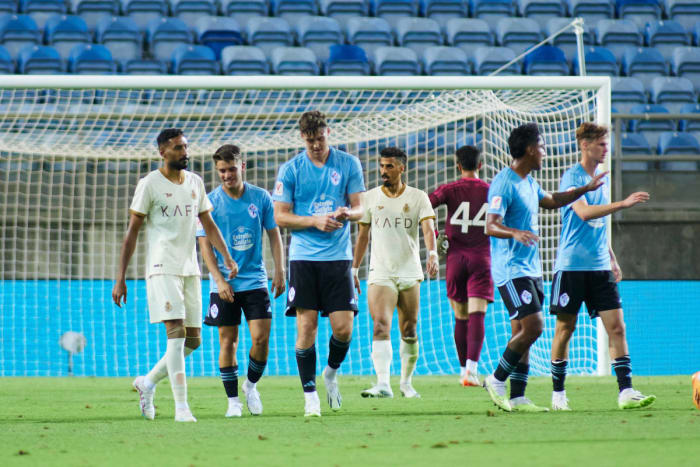 Jorgen Strand Larsen pictured (center) after scoring for Celta Vigo in a 5-0 win over Al Nassr in July 2023